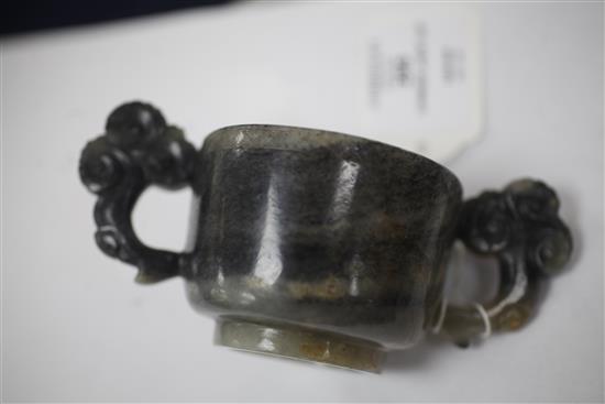 A Chinese grey and black speckled jade two handled cup, 17th/18th century, width 13.3cm